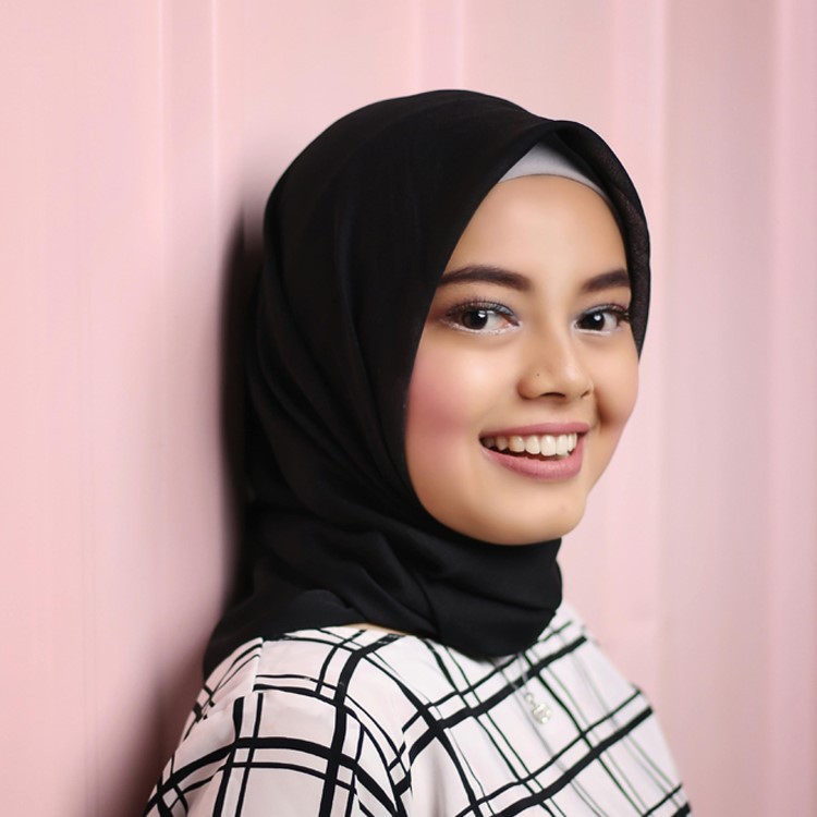A-poised-woman-in-a-black-hijab-delicately-framed-by-the-radiance-of-her-surrounding-environment-manifests-a-perfect-blend-of-tradition-and-elegance A-poised-woman-in-a-black-hijab-delicately-framed-by-the-radiance-of-her-surrounding-environment-manifests-a-perfect-blend-of-tradition-and-elegance